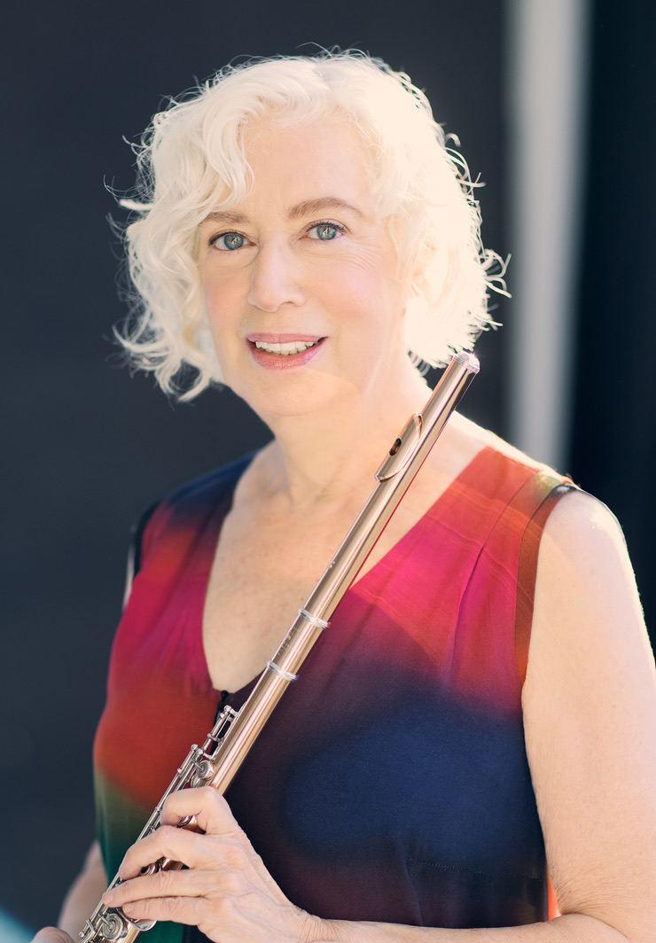 portrait of faculty member meret bitticks holding a flute